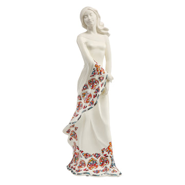 A stylish Nadal Goebel Nadal Sculpture Waiting White 20000881 from Sirene's Collection, featuring an elegant sculpture of a woman in a colorful dress.