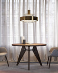 Italamp Crono Suspension Lamp with gold finish and etched glass details, featured in a modern dining room setting, available at Spacio India.