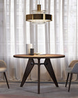 Italamp Crono Suspension Lamp with gold finish and etched glass details, featured in a modern dining room setting, available at Spacio India.