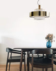 Luxury Italamp Crono Suspension Lamp in satin gold with crystal pendants, illuminating a stylish interior space, offered by Spacio India.