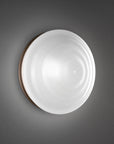 Minimalist circular wall lamp from Italamp Ellepi Collection in white satin glass and bronze trim – available at Spacio India for designer wall lighting.