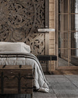 Italamp Gilda Suspension styled as bedside lamps in a carved wood luxury bedroom. Ideal for modern and baroque interiors, available at Spacio India.