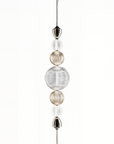 Product studio image of Italamp Greta Suspension Lamp featuring carved crystal orbs and polished nickel elements – available at Spacio India.