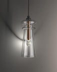 Close-up of Italamp Licio pendant with flared clear glass diffuser and metal core, a blend of elegance and clarity. Spacio India.