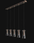 Five-light Italamp Licio suspension lamp in brushed copper and glass finish, ideal for modern interiors. Available at Spacio India.