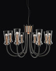 Italamp Licio chandelier with eight arms and transparent diffusers, fusing classical grace with Italian modernity. At Spacio India.