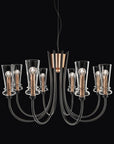 Italamp Licio chandelier with eight arms and transparent diffusers, fusing classical grace with Italian modernity. At Spacio India.