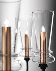 Detail shot of Italamp Licio chandelier showing precision glasswork and metallic candle-style holders. Find it at Spacio India.