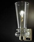 Italamp Licio wall lamp with soft ambient glow and metallic accents, elegant for modern and classical interiors. At Spacio India.