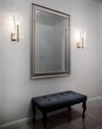 Italamp Licio wall lamps in brushed gold finish flanking a mirror, perfect for modern vanity or powder room styling – available at Spacio India