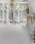 Elegant side view of Italamp Margot Wall Lamp with crystal drops and gold accents, crafted in Italy, available at Spacio India retail stores and online.