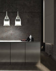 Two white shaded Italamp Nola Pendant Lamps hanging in a contemporary kitchen space – modern Italian lighting solution offered by Spacio India.