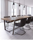 Set of three Italamp Nola Pendant Lamps in transparent finish styled above a wooden dining table, luxury pendant lighting at Spacio India.