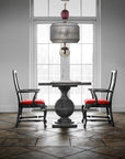 Italamp Odette Odile suspension lamp styled in a dining room with red velvet chairs, luxury Italian lighting at Spacio India