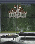 Italamp Prezioso Suspension Light in a modern living room setting with greenery backdrop, showcasing luxury crystal chandelier lighting at Spacio India.