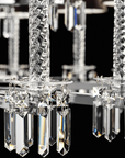 Detail view of twisted crystal stem and prism cut glass drops on Italamp Prezioso suspension light, premium Italian chandelier lighting at Spacio India.