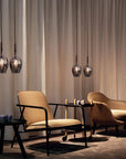 Italamp Rose Maxi Pendant Lamp used in a luxury lounge setting with multiple units creating a warm ambient glow, available at Spacio India.