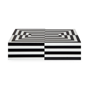A luxury JA Op Art Box Large Black White with black and white stripes on a white surface, inspired by Jonathan Adler's designs.