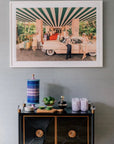 Jonathan Adler Scala Stripe Canister Vase with home accessories decor on a console table in a minimalist interior available at Spacio India for Luxury Home Decor Accessories collection.