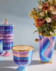 Jonathan Adler Scala Tall Vase on a grey surface with scala bowl & canisters available at Spacio India for Luxury Home Decor Accessories collection.