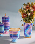 Jonathan Adler Scala Tall Vase on a grey surface with scala bowl & canisters available at Spacio India for Luxury Home Decor Accessories collection.