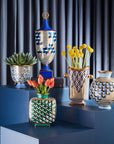 Jonathan Adler Cube Urn Vase with other Versailles Vases on a blue pedestals available at Spacio India for Luxury Home Decor Accessories collection.