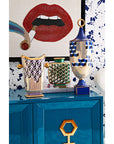 Jonathan Adler Versailles Cube Urn Vase with Hex & Maze Vases on a Console with a Lips Wall Art behind it available at Spacio India for Luxury Home Decor Accessories collection.