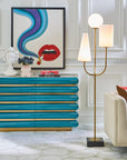 Vibrant interior styling featuring Jonathan Adler Camille Bust Sculpture placed atop a blue and gold dresser, accentuating its modern artistic design, exclusively available at Spacio India retail stores and online.