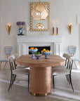 Jonathan Adler Camille Bust Sculpture elegantly styled on a mantelpiece in a luxurious dining area, enhancing interior decor available through Spacio India.