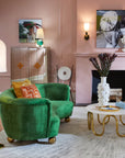 Jonathan Adler Camille Bust Sculpture placed elegantly on a mantelpiece in a sophisticated pink-themed luxury living room, exclusively from Spacio India.