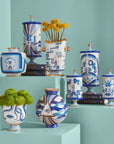 Collection of Jonathan Adler Druggist Eye Vases and surrealist apothecary jars in porcelain with blue and gold accents, glossy glazed finish – showcased at Spacio India