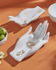 Jonathan Adler Gilded Muse Eve Fruit Bowl in white porcelain with gold detailing, displayed with green apples – available at Spacio India