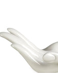 Detail of sculpted fingers on the Jonathan Adler Gilded Muse Eve Fruit Bowl in glossy white porcelain – available at Spacio India