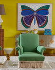Jonathan Adler Large Lacquer Botanist Box stacked on mirrored cabinet with butterfly painting – vibrant home decor from Spacio India.