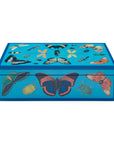 Jonathan Adler Medium Lacquer Botanist Box in peacock blue lacquer with vibrant butterfly and insect illustrations, a luxurious storage piece with navy trim and peacock velvet lining, available at Spacio India.