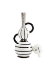 Jonathan Adler Medium Vienna Decanter in porcelain featuring black and white stripes with gold accents, elegantly placed on a marble table. Available at Spacio India retail stores and online.