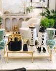 Artistic view of the Jonathan Adler Rocket Whiskey Mid-Century Decanter, emphasizing its unique mid-century design and intricate detailing on high-fired glossy white porcelain, available at Spacio India.
