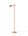 Copper floor lamp with a single light head on a white background