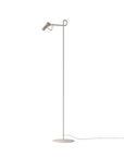 Modern floor lamp with adjustable head on a white background