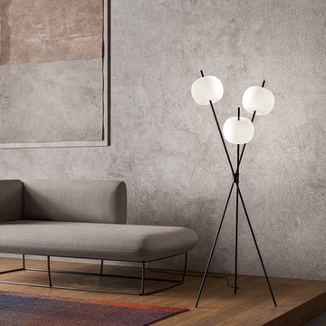 A floor lamp from KDLN standing in the corner of a Luxury Living Room styled by Spacio India Interior Styling Team