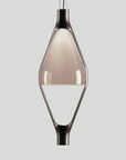 A KDLN Vice Versa Pendant Light with a glass shade.
