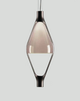 A KDLN Vice Versa Pendant Light with a glass shade.