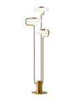 KDLN Tratto Floor Lamp in brass finish on a white background