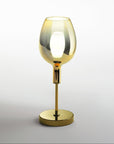 Gold table lamp with a wine glass design on a white background from Italamp available at Spacio in India.