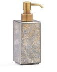 Soap dispenser with gold pump and textured silver and gold body on a white background from Labrazel at Spacio retail store in Mumbai