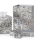 Bathroom accessory set with leaf pattern on a white background from Labrazel on a white background at Spacio retail store in Mumbai