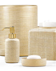 Set of beige textured woven gold bathroom accessories set from Labrazel including a bottle, container, and bowl on a white background at Spacio retail store in India