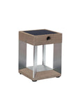 Small solar lantern with wooden finish and metal legs on a white background by Les Jardins available at Spacio retail stores in Mumbai & Kolkata.