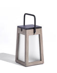 Modern solar lantern with wooden frame and black top on a white background by Les Jardins available at Spacio retail stores in Mumbai & Kolkata.