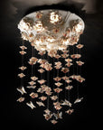 Decorative chandelier with floral design on a black background